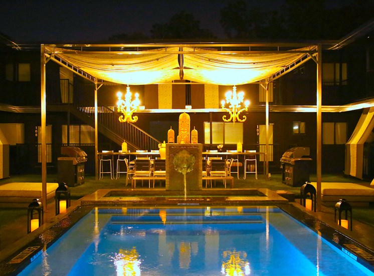 5601 Gaston The London Chandelier And Pool At Nighttime